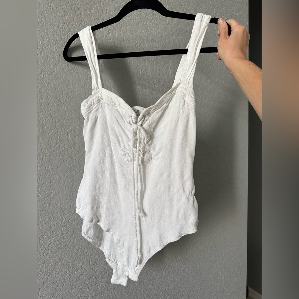 Free People Intimately Bodysuit with Lace up top. Size M